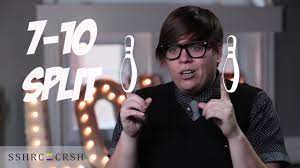 Dr. Shelly Moore pointing two fingers up to represent bowling pins split