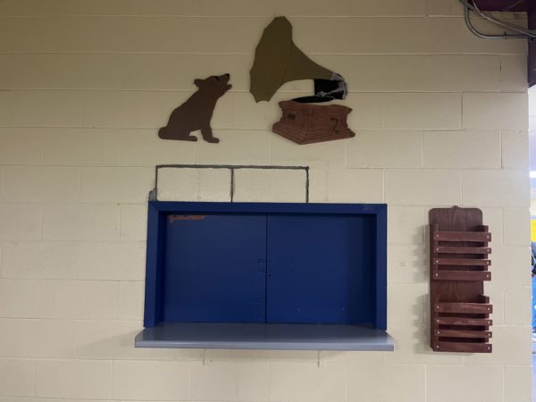 A window to the room that hosts the school radio.