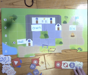 Kubo base map with 3 sight words taped to various locations