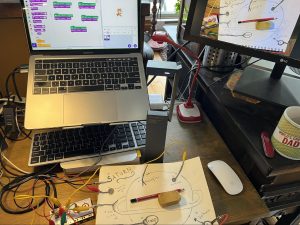 A Makey Makey attached to a graphite drawing